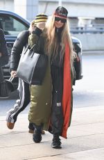 STACY FERGIE FERGUSON Arrives at JFK Airport in New York 12/01/2022