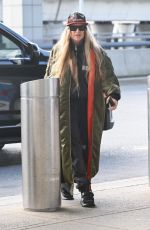 STACY FERGIE FERGUSON Arrives at JFK Airport in New York 12/01/2022