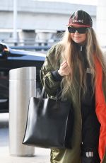 STACY FERGIE FERGUSON Arrives at JFK Airport in New York 12/01/2022