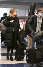 SUKI WATERHOUSE and Robert Pattinson Arrives at JFK Airport in New York 12/27/2022