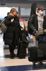SUKI WATERHOUSE and Robert Pattinson Arrives at JFK Airport in New York 12/27/2022