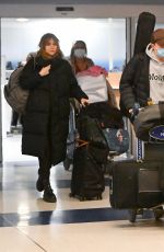 SUKI WATERHOUSE and Robert Pattinson Arrives at JFK Airport in New York 12/27/2022
