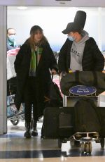 SUKI WATERHOUSE and Robert Pattinson Arrives at JFK Airport in New York 12/27/2022
