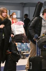 SUKI WATERHOUSE and Robert Pattinson Arrives at JFK Airport in New York 12/27/2022