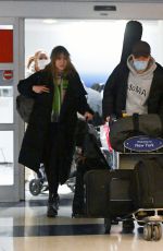 SUKI WATERHOUSE and Robert Pattinson Arrives at JFK Airport in New York 12/27/2022