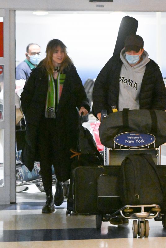 SUKI WATERHOUSE and Robert Pattinson Arrives at JFK Airport in New York 12/27/2022