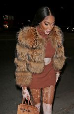 WINNIE HARLOW Leaves Revolve Winterland Holiday Event in Los Angeles 12/08/2022