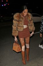 WINNIE HARLOW Leaves Revolve Winterland Holiday Event in Los Angeles 12/08/2022