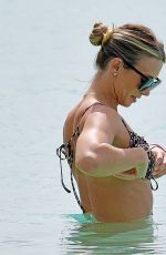 AMELIA TANK and Olly Murs on Vacation in Barbados 01/05/2023