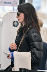 ANNE HATHAWAY Arrives at JFK Airport in New York 01/20/2023
