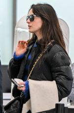 ANNE HATHAWAY Arrives at JFK Airport in New York 01/20/2023