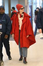 ANNE HATHAWAY Arrives at Salt Lake City Airport in Park City 01/22/2023