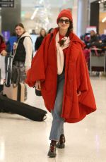 ANNE HATHAWAY Arrives at Salt Lake City Airport in Park City 01/22/2023