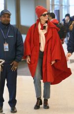 ANNE HATHAWAY Arrives at Salt Lake City Airport in Park City 01/22/2023