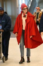 ANNE HATHAWAY Arrives at Salt Lake City Airport in Park City 01/22/2023
