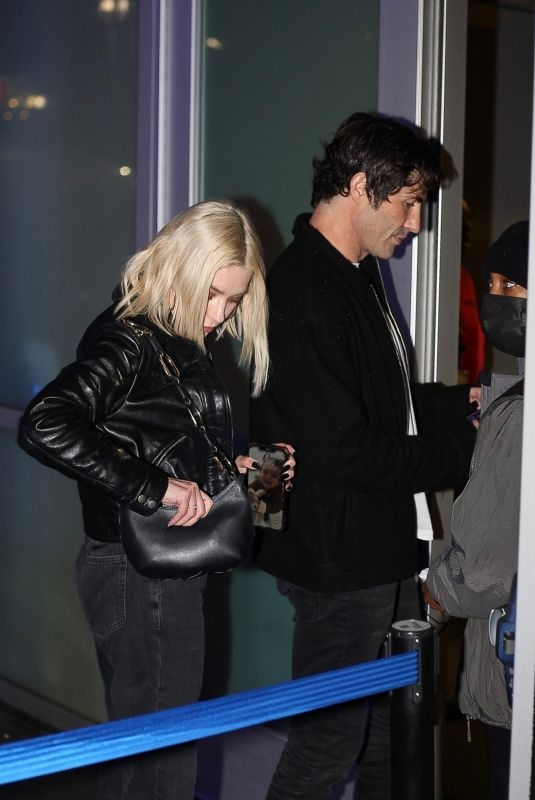 ASHLEY BENSON and Brandon Davis Arrives at Lakers Game in Los Angeles 01/05/2023