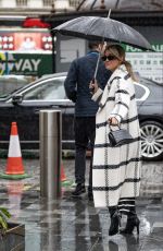 ASHLEY ROBERTS Arrives at Global Radio Studios in London 01/10/2023