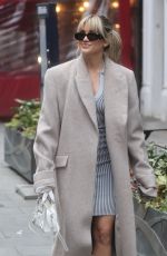 ASHLEY ROBERTS Arrives at Heart Radio in London 01/26/2023