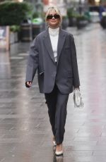 ASHLEY ROBERTS in a Grey Trouser Suit Out in London 01/04/2023