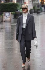 ASHLEY ROBERTS in a Grey Trouser Suit Out in London 01/04/2023