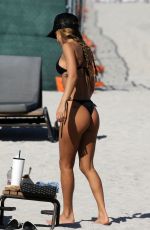 CHANTEL JEFFRIES in a Black Bikini at a Beach in Miami 01/30/2023