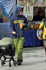 CLARA BERRY and KJ Apa Out with Their Baby and Dog at Farmers Market in Los Angeles 01/15/2023