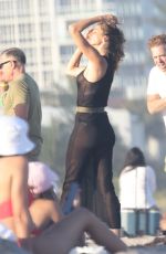 GISELE BUNDCHEN at a Photoshoot on the Beach in Los Angeles 01/25/2023