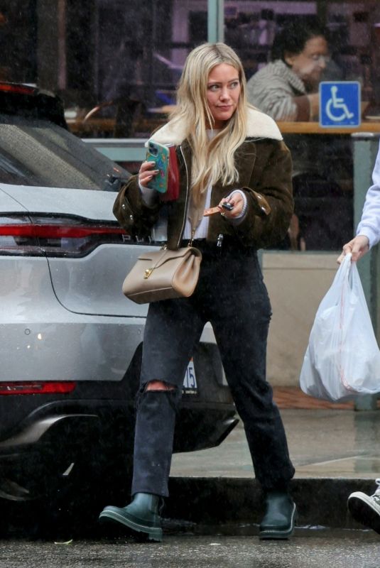 HILARY DUFF Gets Lunch to-go in Beverly Hills 01/04/2023