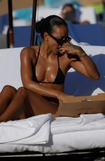 KARRUECHE TRAN in Bikini at a Beach in Miami 12/31/2022