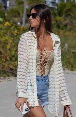 KELLY PIQUET in Swimsuit at a Beach in Miami 01/23/2023