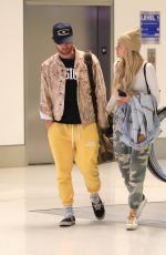 KELSEA BALLERINI and Chase Stokes at LAX Airport in Los Angeles 01/29/2023