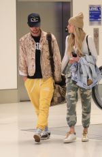 KELSEA BALLERINI and Chase Stokes at LAX Airport in Los Angeles 01/29/2023