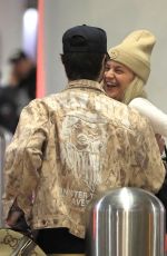 KELSEA BALLERINI and Chase Stokes at LAX Airport in Los Angeles 01/29/2023