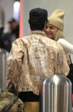 KELSEA BALLERINI and Chase Stokes at LAX Airport in Los Angeles 01/29/2023