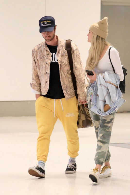 KELSEA BALLERINI and Chase Stokes at LAX Airport in Los Angeles 01/29/2023