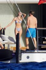 MADISON HEADRICK in Bikini at Leonardo DiCaprio