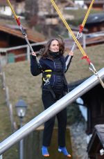 NATALIE PORTMAN on a Bungee Trampoline in Gstaad 01/01/2023