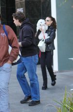 NICOLA PELTZ and Brooklyn Beckham Out for Lunch with Their Dog at Sweetgreen Health Food Restaurant in Beverly Hills 01/24/2023