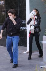 NICOLA PELTZ and Brooklyn Beckham Out for Lunch with Their Dog at Sweetgreen Health Food Restaurant in Beverly Hills 01/24/2023