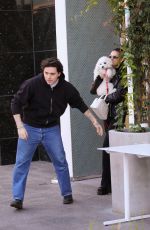 NICOLA PELTZ and Brooklyn Beckham Out for Lunch with Their Dog at Sweetgreen Health Food Restaurant in Beverly Hills 01/24/2023