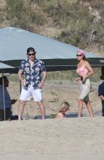 NICOLA PELTZ and SELENA GOMEZ at a Beach in Cabo San Lucas 01/02/2023
