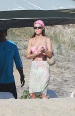 NICOLA PELTZ and SELENA GOMEZ at a Beach in Cabo San Lucas 01/02/2023