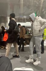 NICOLE MURPHY Out with a Mystery Man at Aspen Airport 01/04/2023