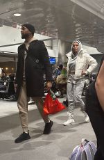 NICOLE MURPHY Out with a Mystery Man at Aspen Airport 01/04/2023