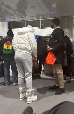 NICOLE MURPHY Out with a Mystery Man at Aspen Airport 01/04/2023