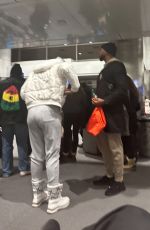 NICOLE MURPHY Out with a Mystery Man at Aspen Airport 01/04/2023
