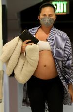 Pregnant CHRISSY TEIGEN at a Doctor