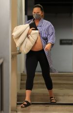 Pregnant CHRISSY TEIGEN at a Doctor