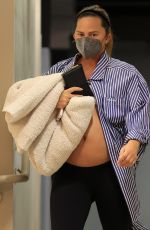 Pregnant CHRISSY TEIGEN at a Doctor