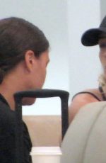 SAMANTHA KERR and KRISTIE MEWIS at Perth Airport 01/04/2023